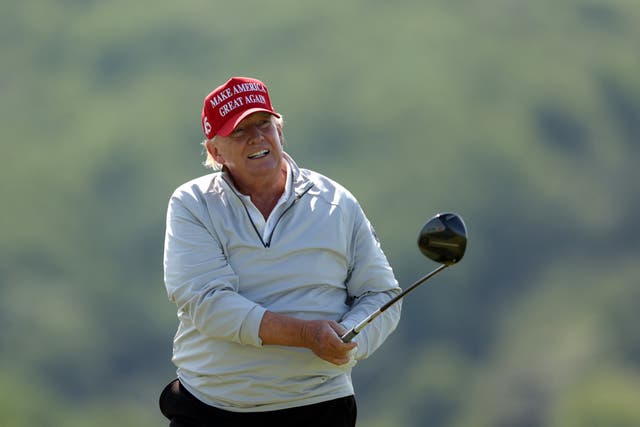 <p>Former US President Donald Trump plays a tee shot during the pro-am prior to the LIV Golf Invitational - DC at Trump National Golf Club on May 25, 2023 in Sterling, Virginia</p>