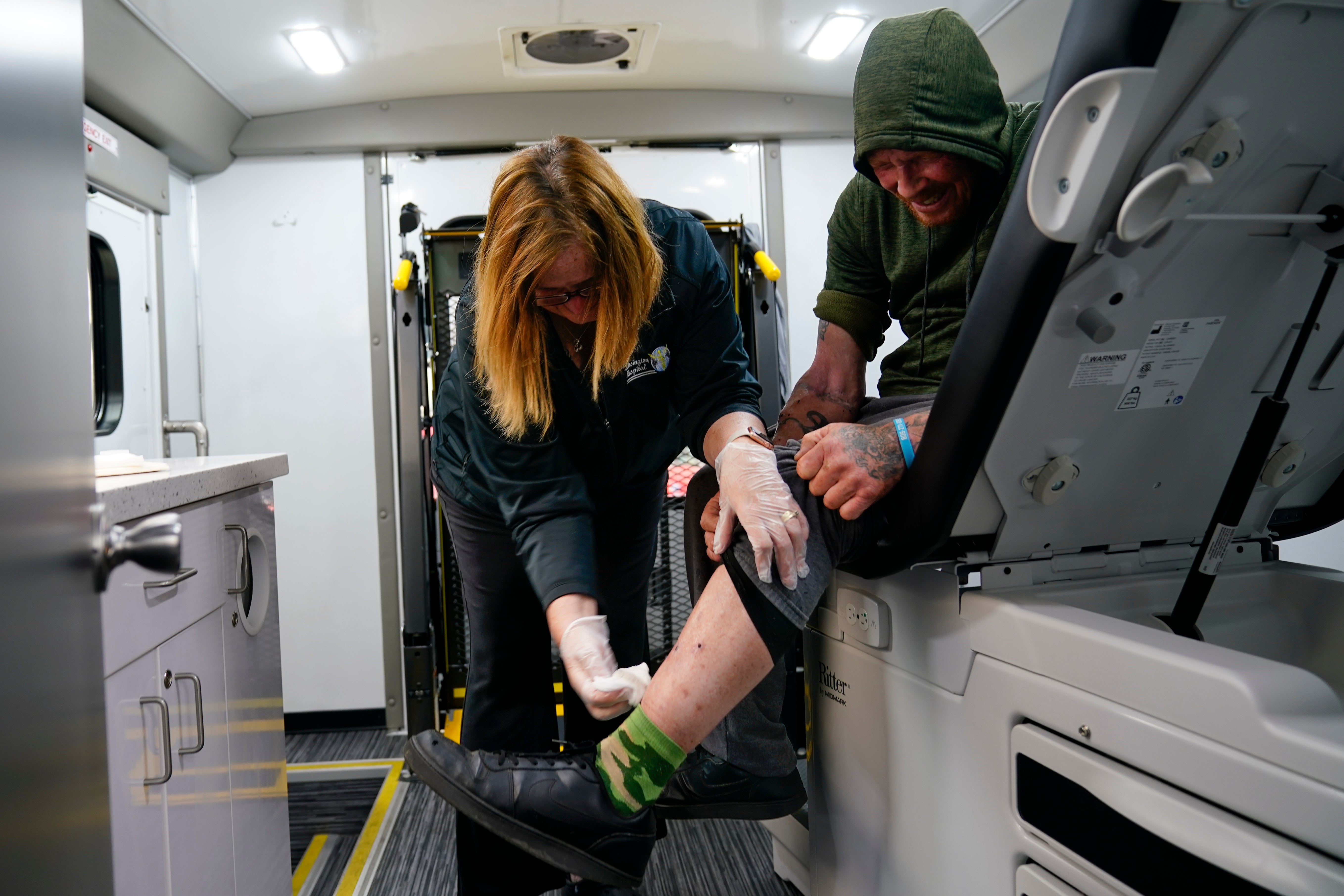 A nurse treats leg wounds in Philadelphia, where xylazine has been linked to 31 per cent of heroin and fentanyl overdose deaths