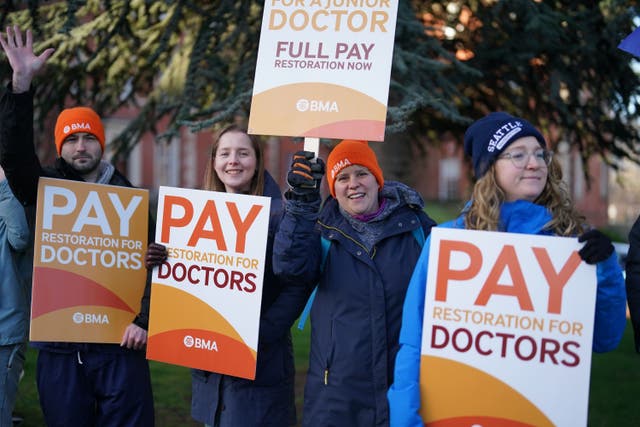 <p>Striking NHS junior doctors on the picket line in April </p>