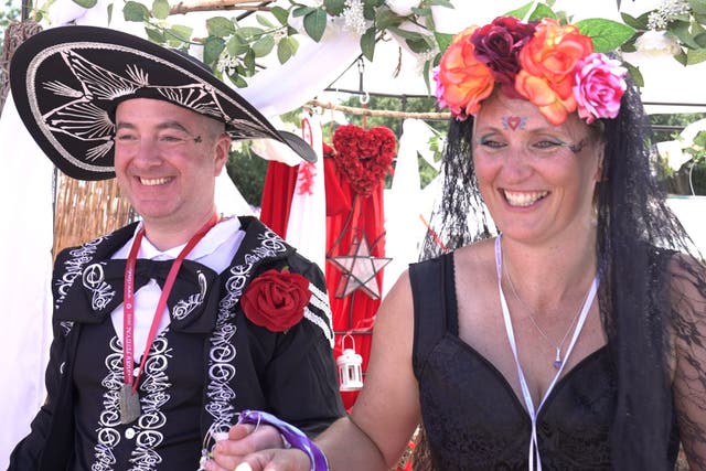 Stuart Beauchamp and Anna Stevens took part in a handfasting ceremony at Glastonbury to ‘seal their marriage’ (Tom Leese/PA)