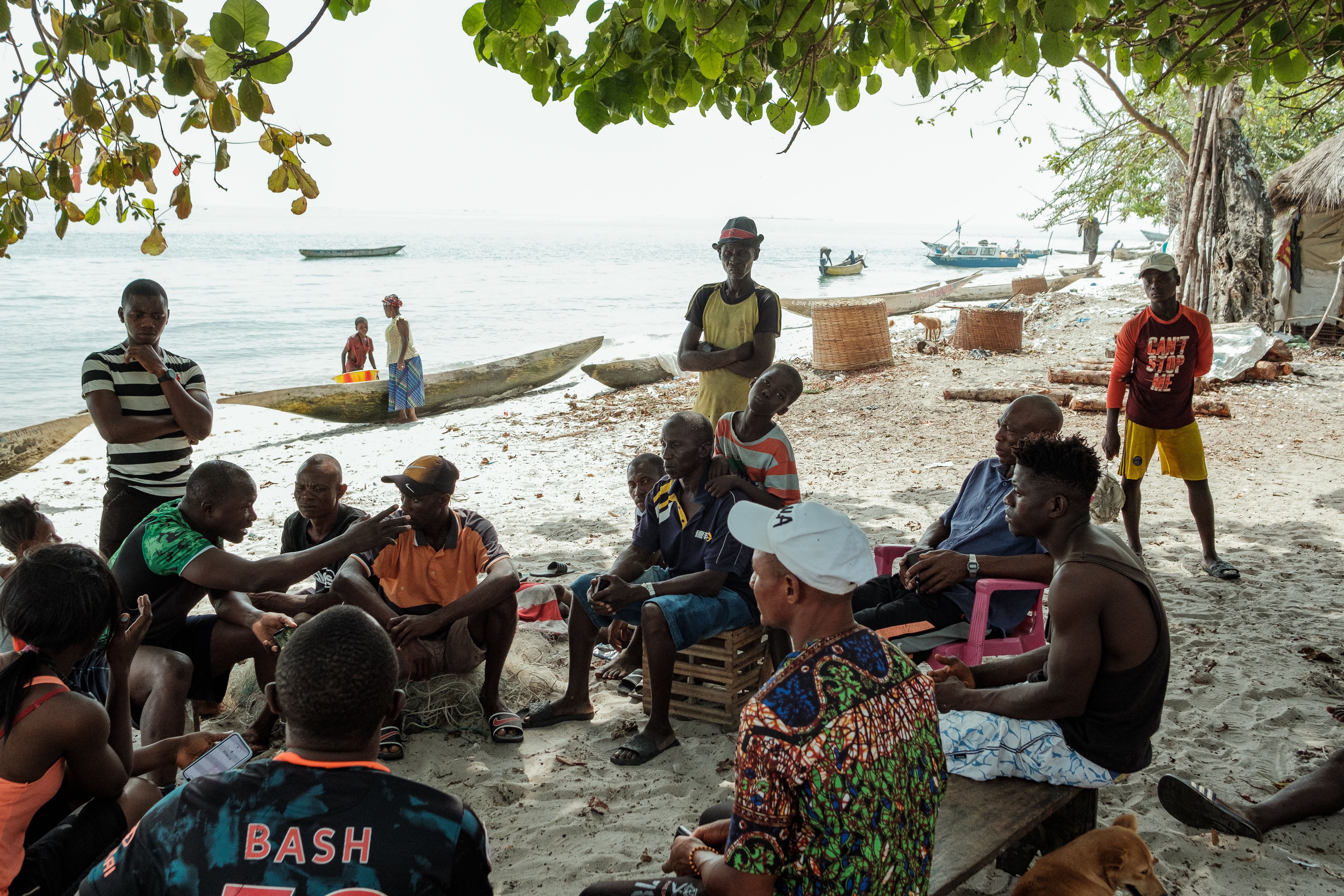 The research team discusses the importance of protecting and monitoring seagrass with locals