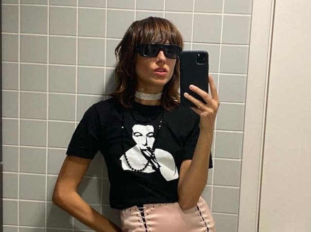 <p>Louise Verneuil, girlfriend of Alex Turner of Arctic Monkeys, poses in front of a bathroom mirror</p>