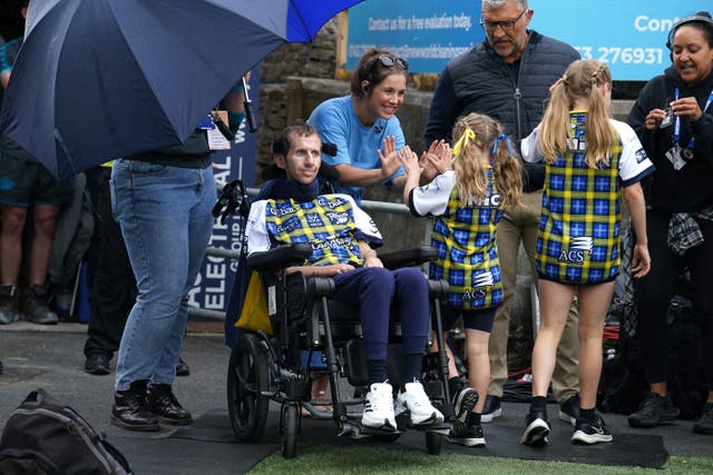 Rob Burrow and family were star guests at Leeds Rhinos’ annual MND Awareness Day (Martin Rickett/PA)