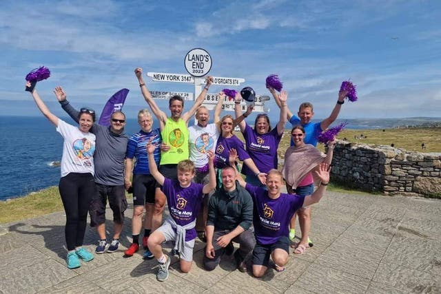 Rob Walker (in yellow) has completed his journey from John O’Groats to Land’s End in memory of four absent friends (Rob Walker)