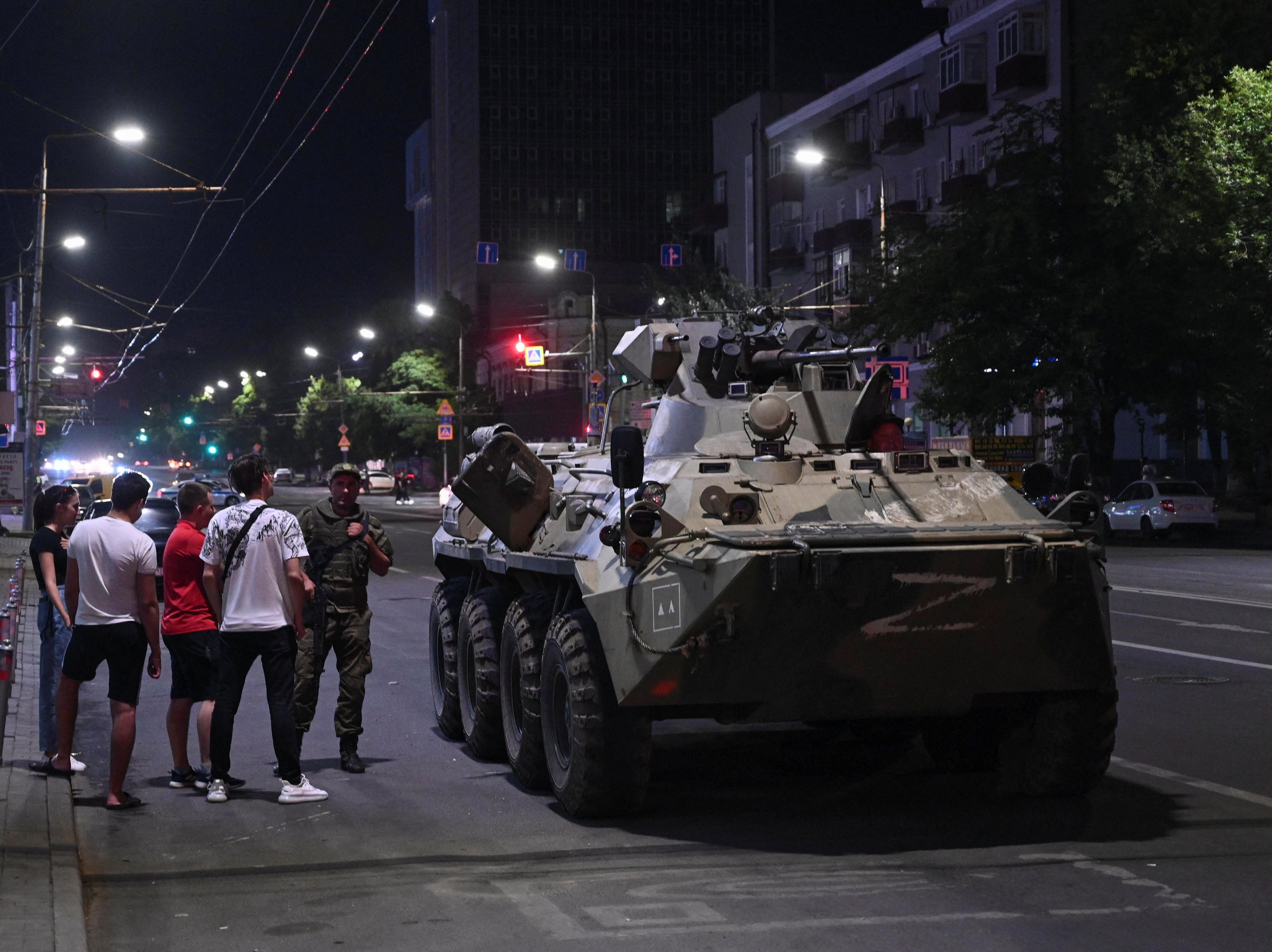 An armoured personnel carrier (APC) is seen on a street of the southern city of Rostov-on-Don on Satuday