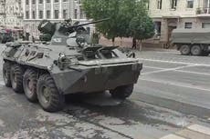 Military vehicles on streets of Rostov-on-Don as Wagner chief claims control of HQ