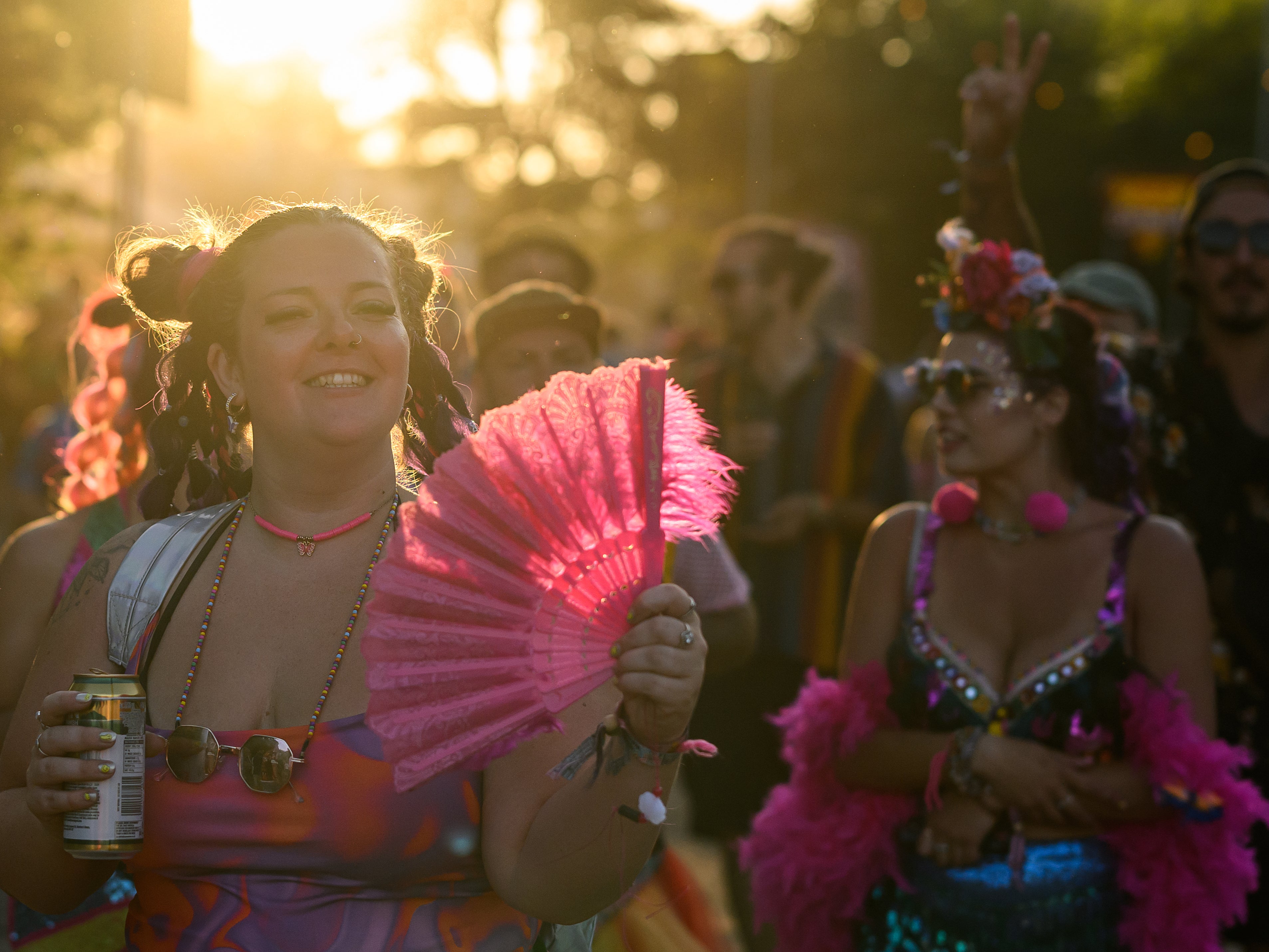 Bathed in golden nostalgia: Revellers enjoy the sunset on day two at Glastonbury