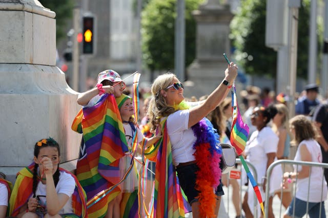 People on O’Connell Street in Dublin during the Dublin Pride parade (Nick Bradshaw/PA)