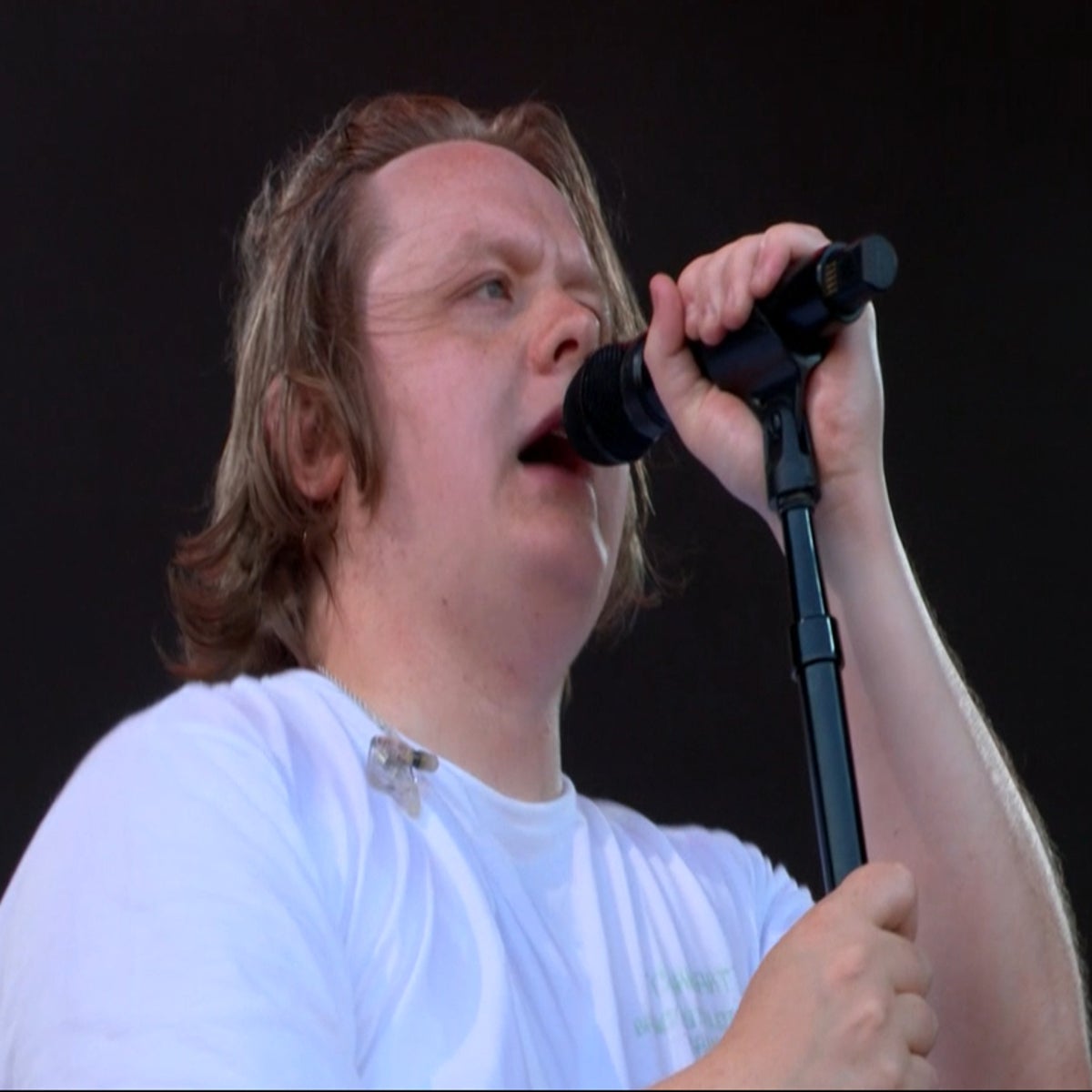 Intensity and emotion as Lewis Capaldi grips the microphone during his powerful set.
