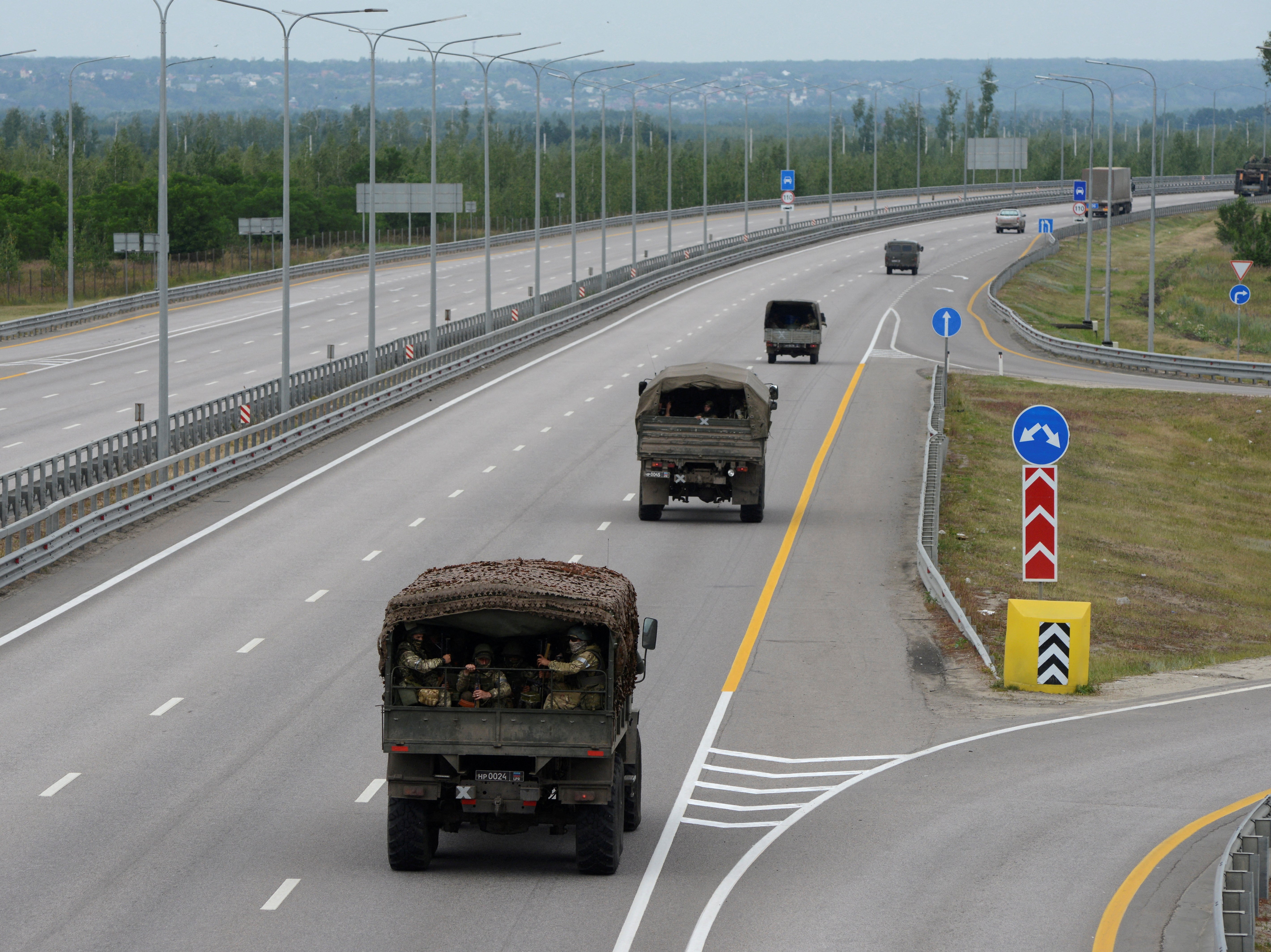 A military column of Wagner private mercenary group drives along M-4 highway