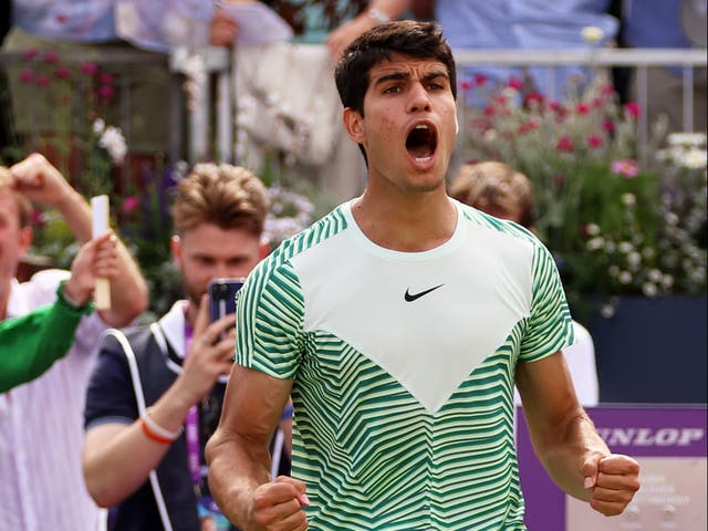 <p>Carlos Alcaraz celebrates after defeating Sebastian Korda in the Queen’s semi-finals </p>