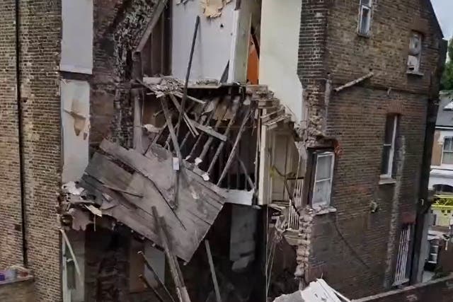 <p>An entire three-storey house collapsed in Hackney, London </p>