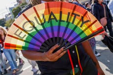 Party and protest mix as LGBTQ+ pride parades kick off from New York to San Francisco