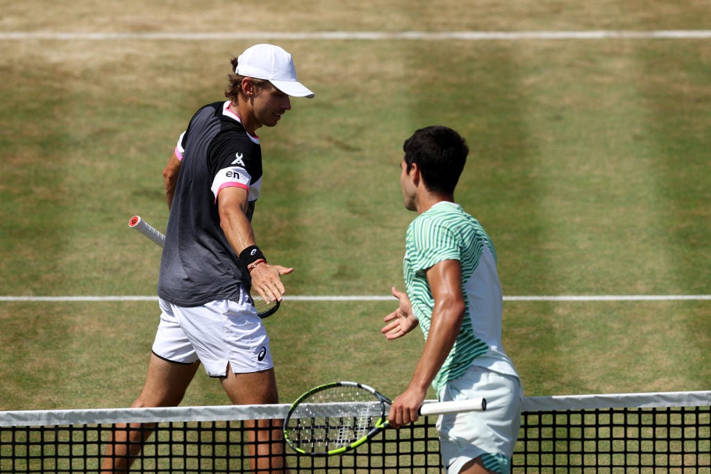 Alcaraz, right, had too much for De Minaur in the Queen’s final