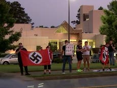 Neo-Nazis terrorize Jewish community by brandishing swastika flags outside Georgia synagogue