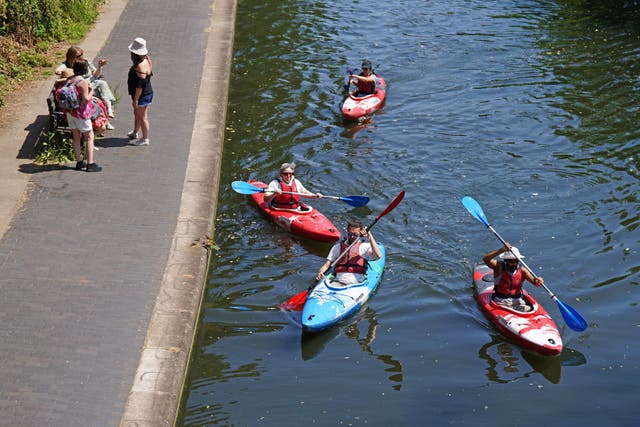 Kayakers on Regent’s Canal (James Manning/PA)