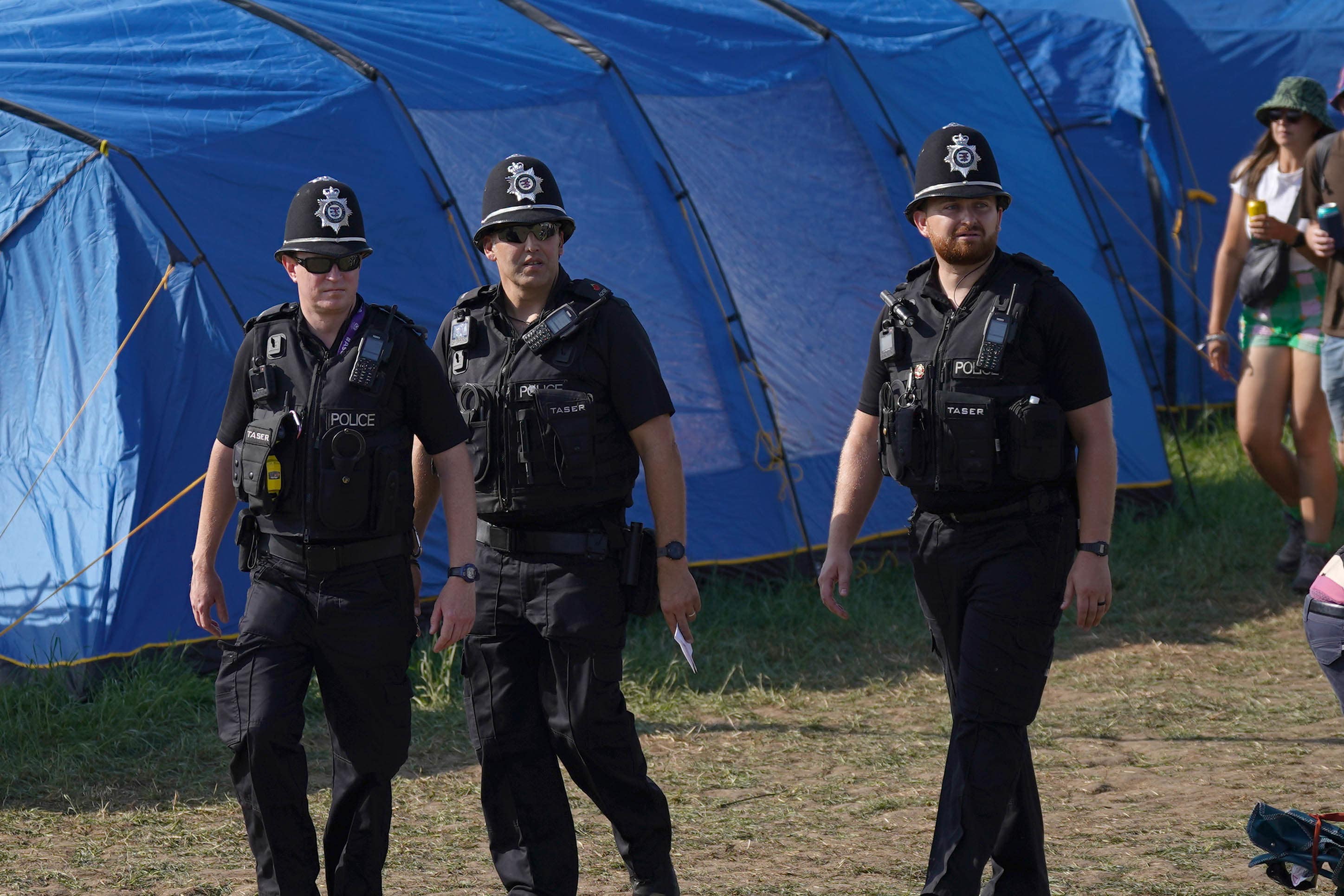 Police officers at Glastonbury Festival as a man in his 40s is found dead there (Yui Mok/PA)