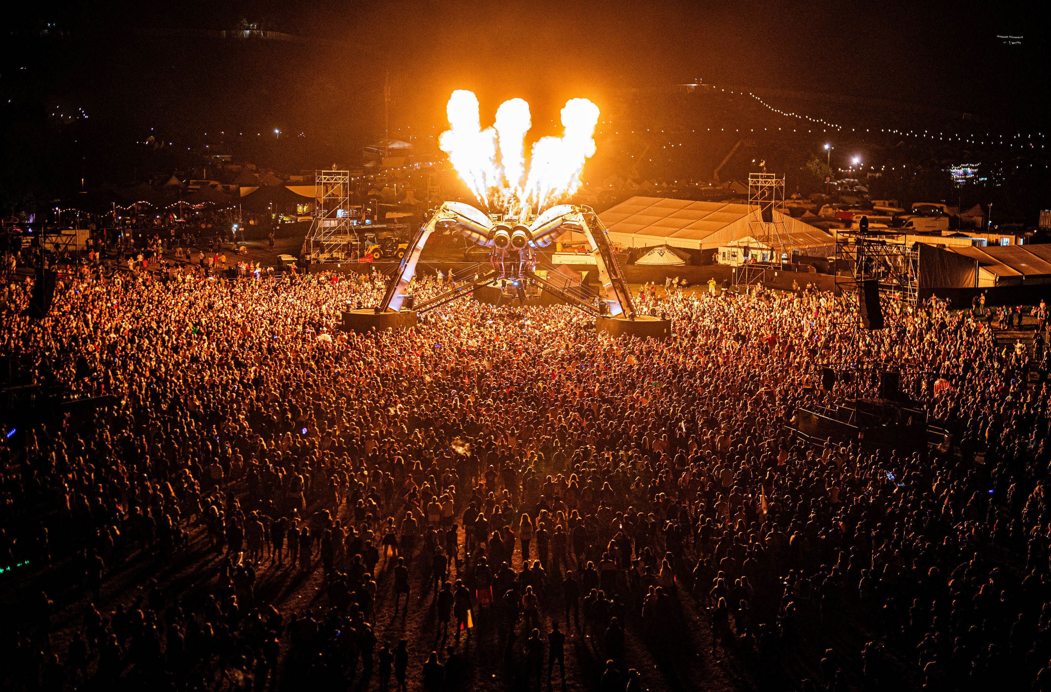 Chemical Brothers perform beneath the Arcadia spider at Glastonbury Festival