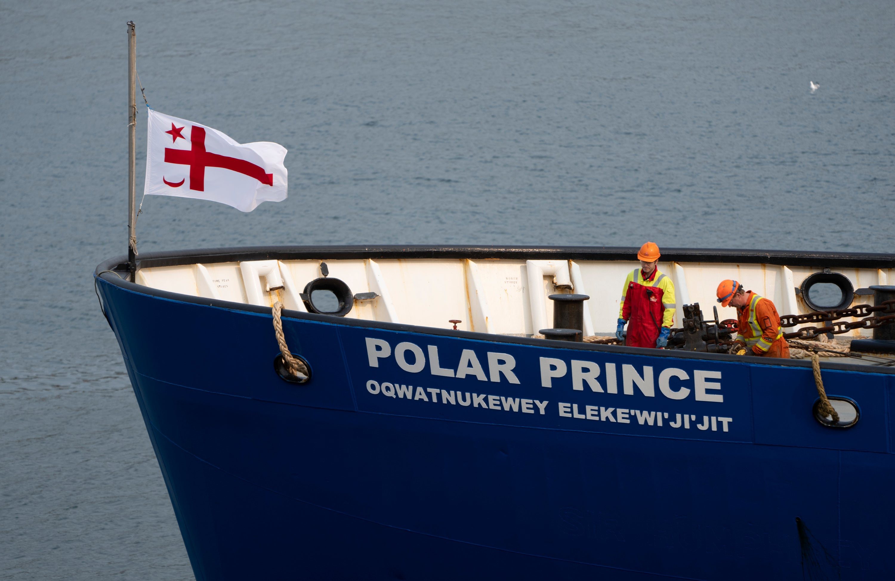 Crew members of the Polar Prince prepare to dock the ship as it arrives at the Coast Guard wharf in on Saturday, June 24, 2023 in St. John's, Newfoundland