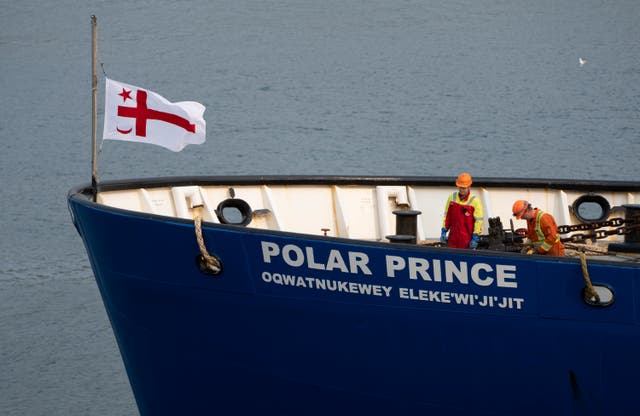 <p>Crew members of the Polar Prince prepare to dock the ship as it arrives at the Coast Guard wharf in on Saturday, June 24, 2023 in St. John's, Newfoundland</p>