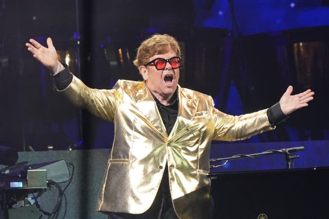 <p>Elton John performing on the Pyramid Stage (Yui Mok/PA)</p>