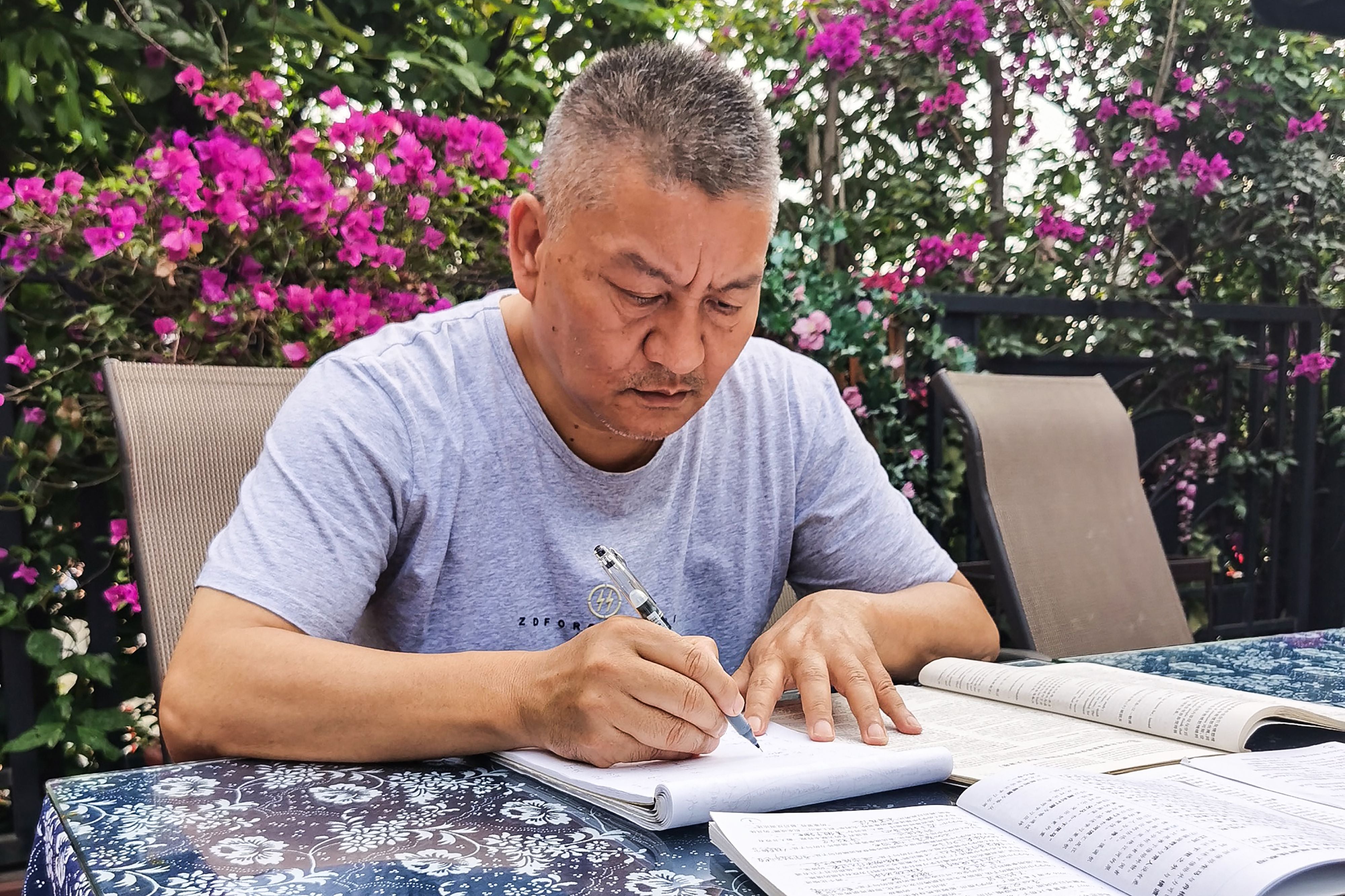 Liang Shi going through exam papers ahead of the exam in Chengdu, in China’s southwestern Sichuan province