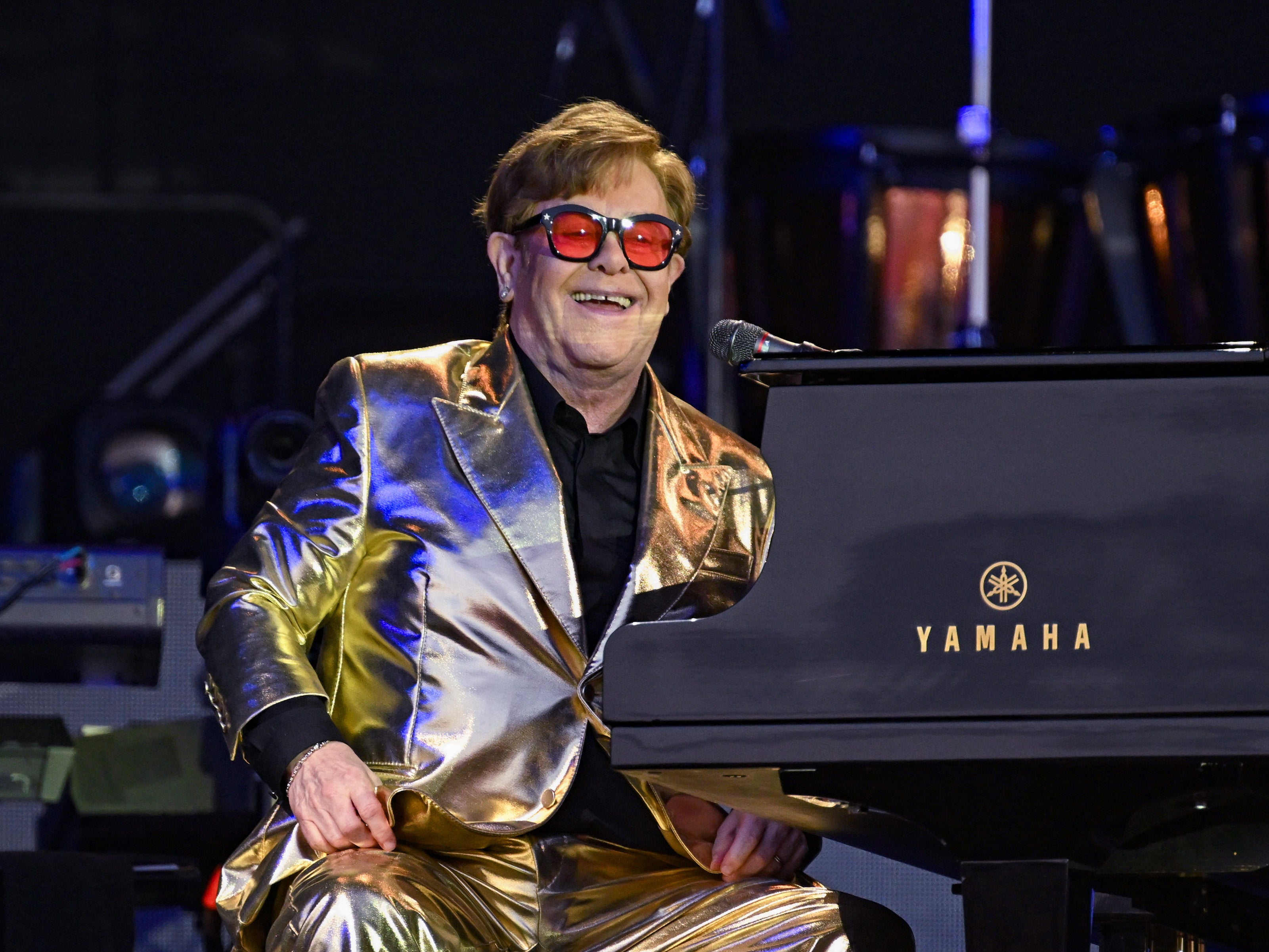 Elton John brought a joyful sense of occasion to the day at the festival on Sunday