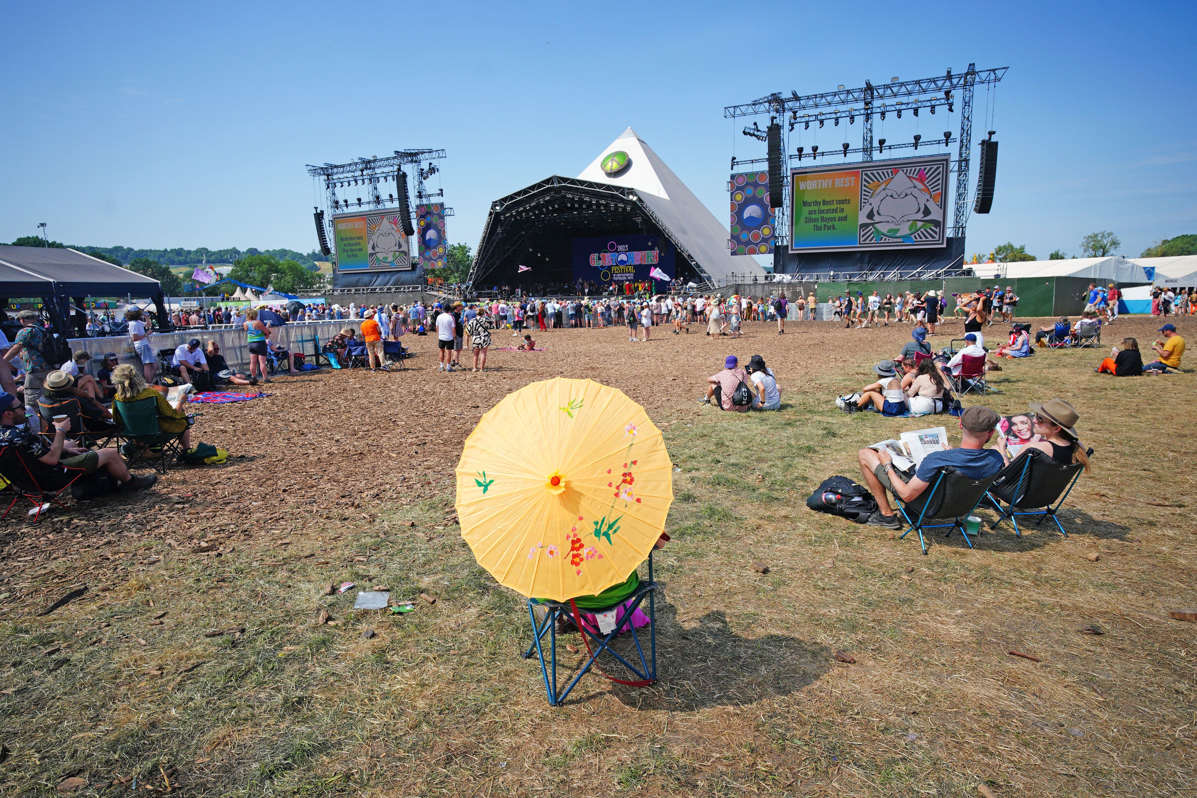 Festivalgoers during the hot weather at the Glastonbury Festival at Worthy Farm in Somerset (Ben Birchall/PA)