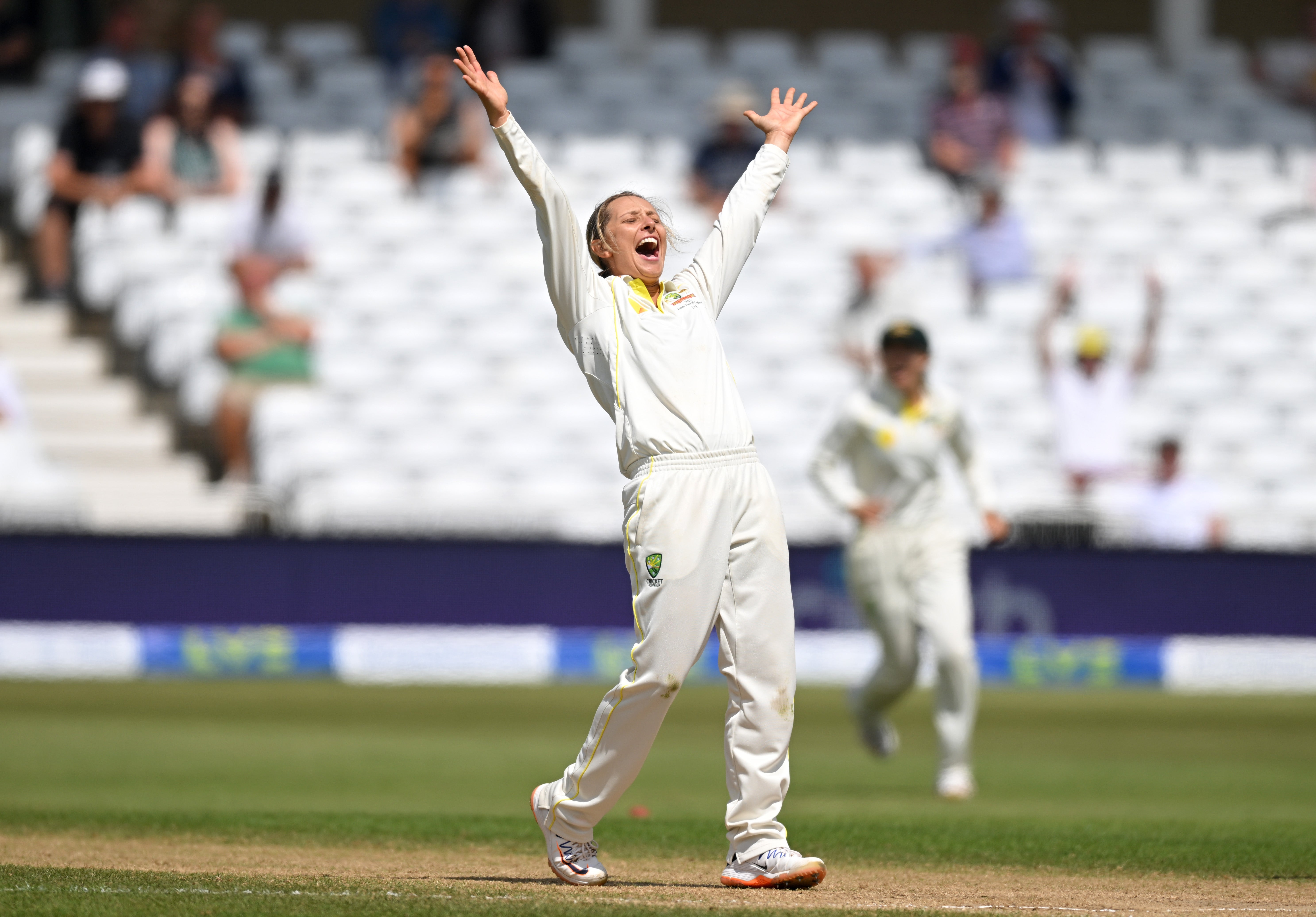 Ashleigh Gardner of Australia celebrates taking the final wicket of Danni Wyatt