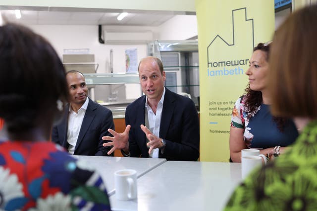 The Prince of Wales speaks with members during a visit to Mosaic Clubhouse in Lambeth as he launched his Homewards initiative (Chris Jackson/PA)