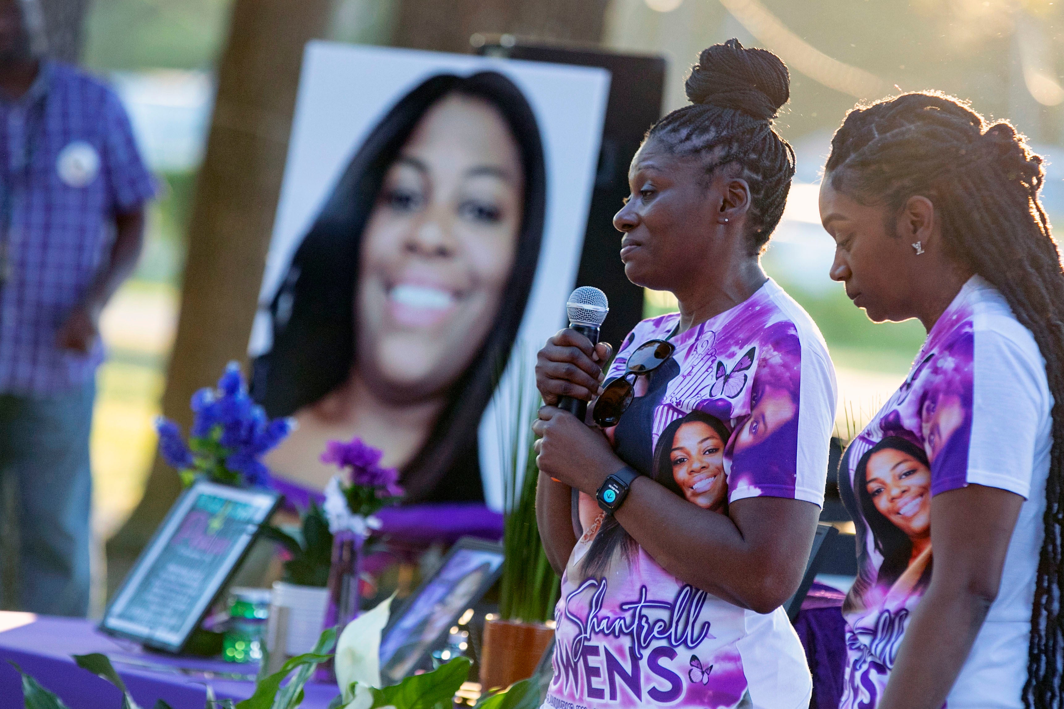 Pamela Dias, second from right, at a remembrance service for her daughter Ajike ‘AJ’ Owens