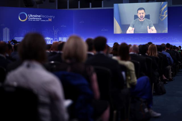 Ukraine’s President Volodymyr Zelensky delivers a speech via videolink at the opening session on the first day of the Ukraine Recovery Conference in London (Henry Nicholls/PA)