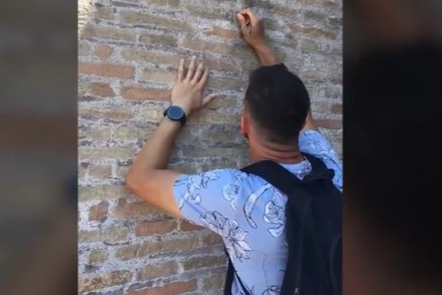 <p>Tourist filmed defacing Colosseum in Rome</p>