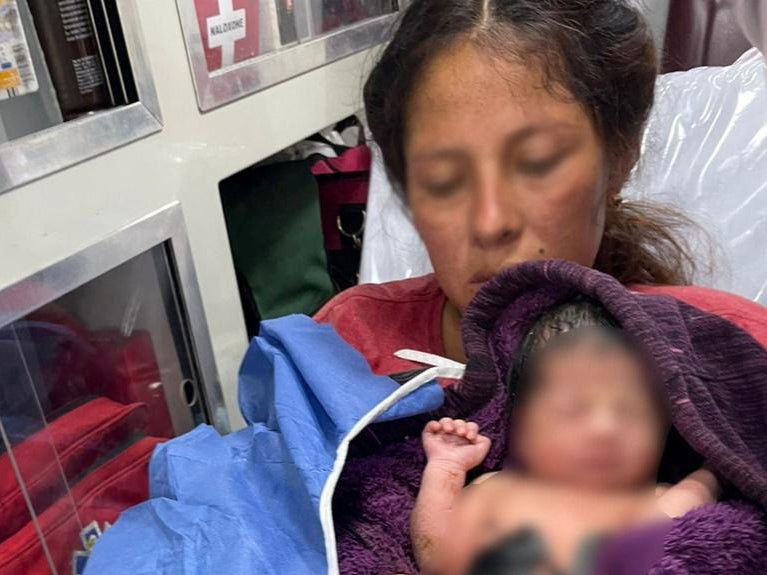 Bus of migrants help mother give birth before being detained in Mexico