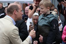 William jokes he’ll get into trouble as he hugs well-wishers in east Belfast