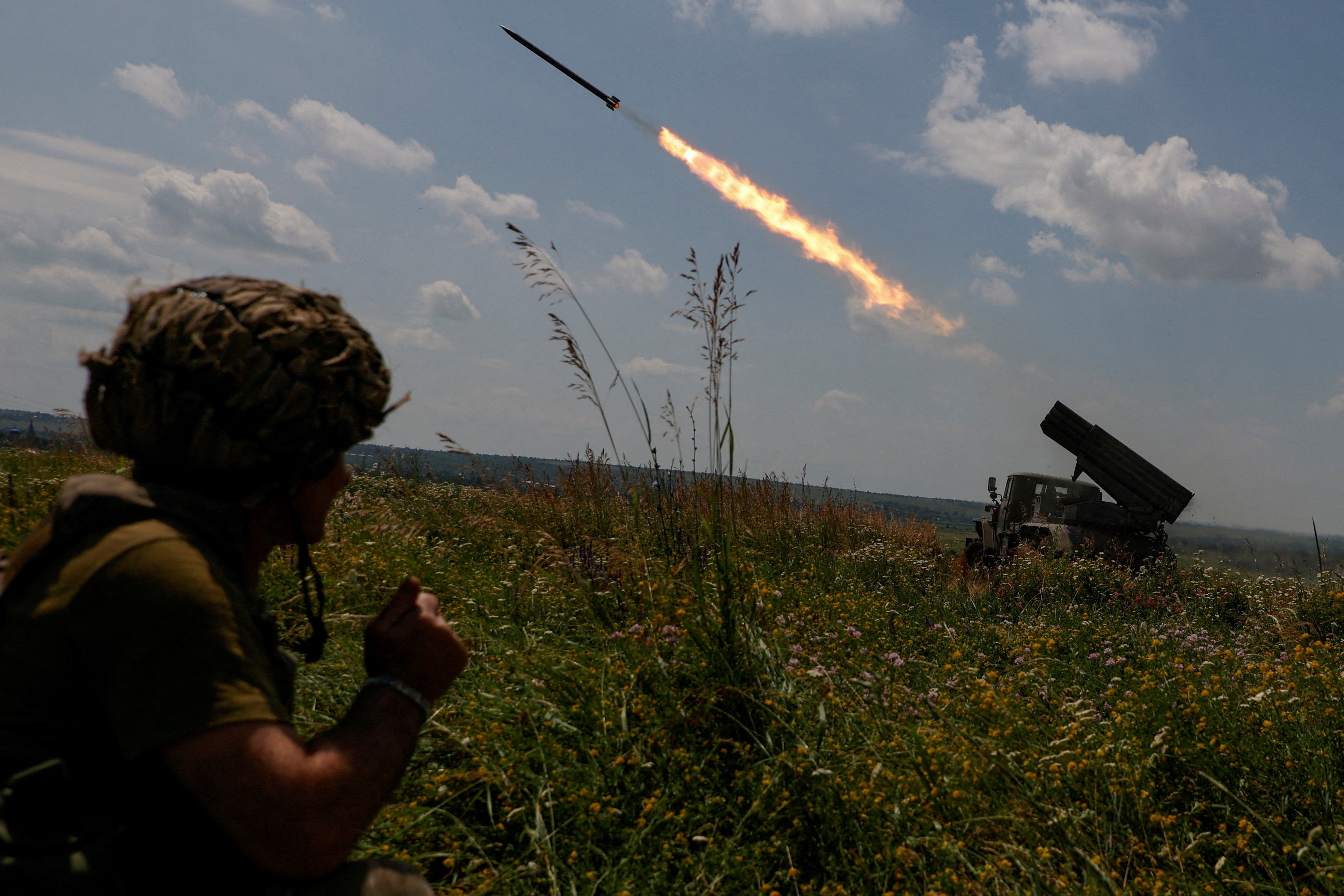 Ukrainian servicemen of the 47th Magura Separate Mechanised Brigade fire a BM-21 Grad multiple launch rocket system towards Russian troops near a front line in Zaporizhzhia region, 25 June 2023