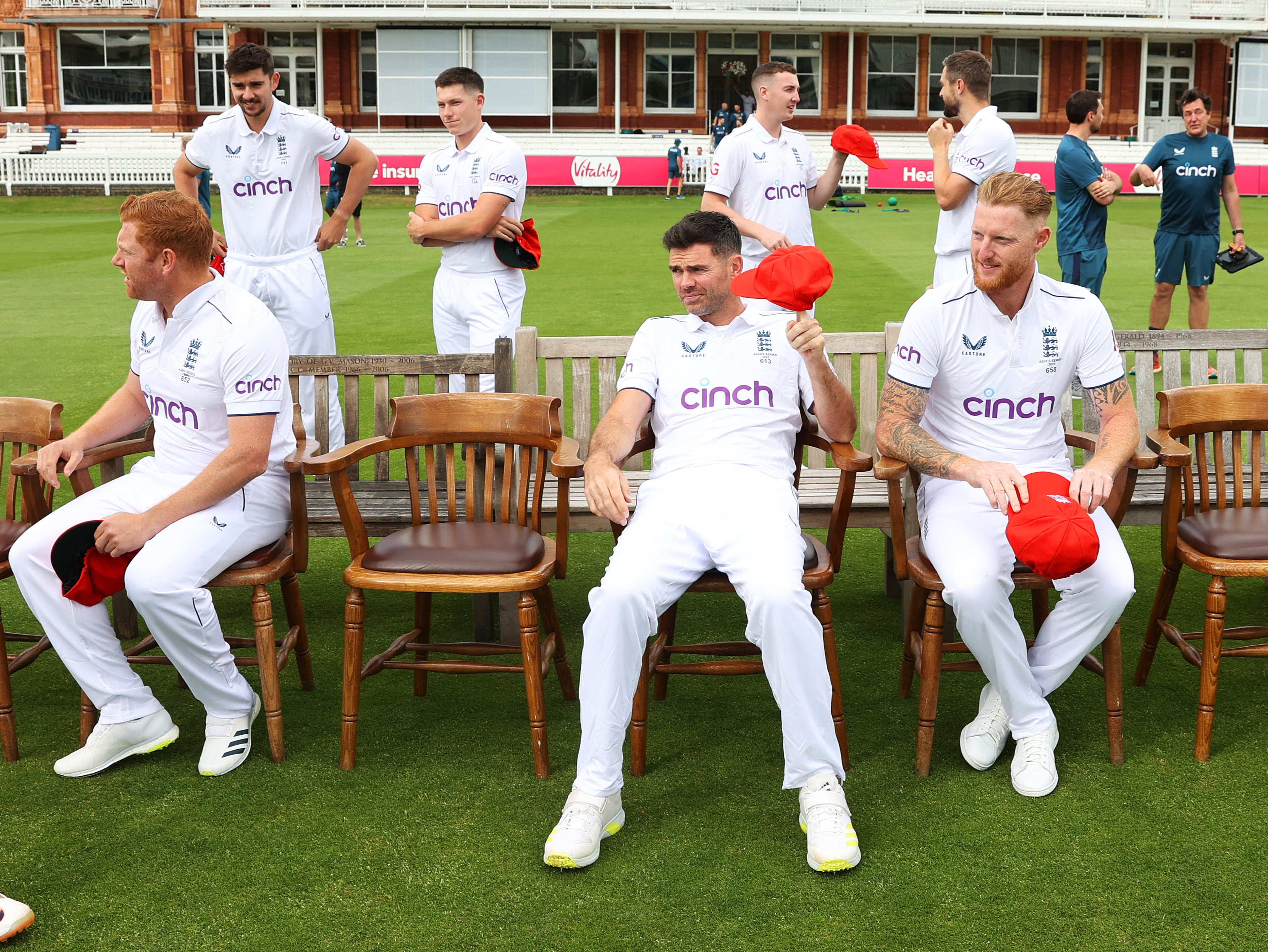 Jonny Bairstow, James Anderson and Stokes sit down for a photoshoot as the rest of the team assemble