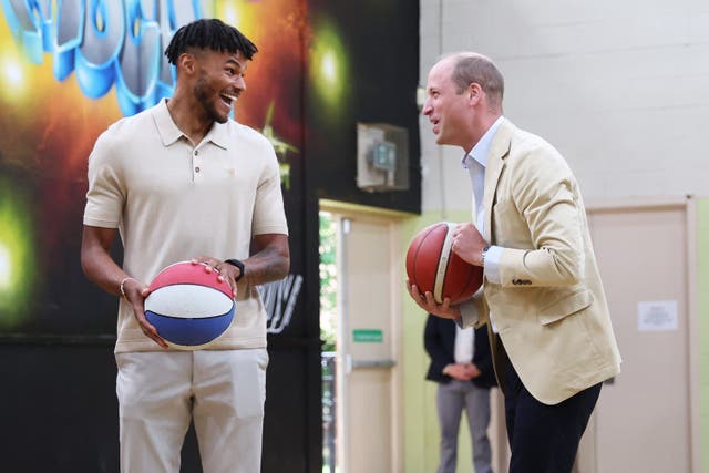 The Prince of Wales plays basketball with footballer Tyrone Mings (Cameron Smith/PA)
