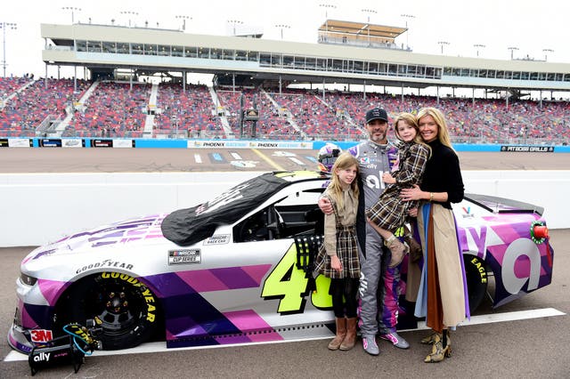 <p>Jimmie Johnson, driver of the #48 Ally Chevrolet, poses on the grid with his wife Chandra Johnson and their daughters Lydia Norriss Johnson and Genevieve Johnson prior to the NASCAR Cup Series Season Finale 500 at Phoenix Raceway on November 08, 2020 in Avondale, Arizona.</p>