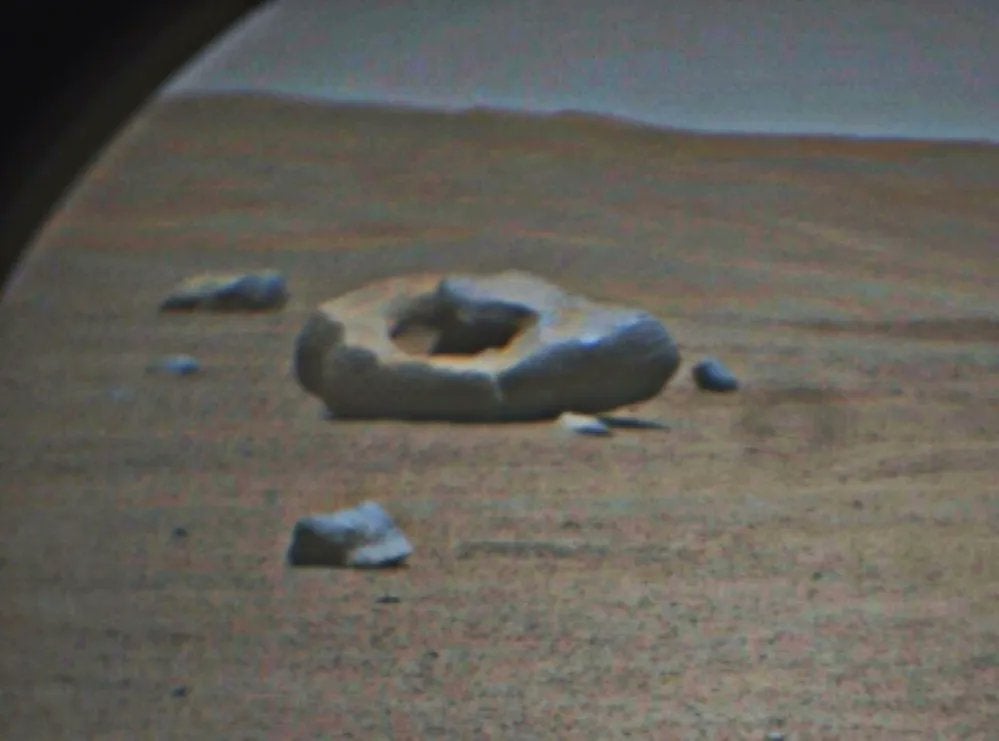 <p>Donut-shaped rock on Mars</p>