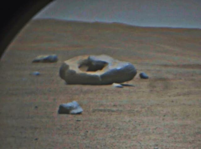 <p>Donut-shaped rock on Mars</p>
