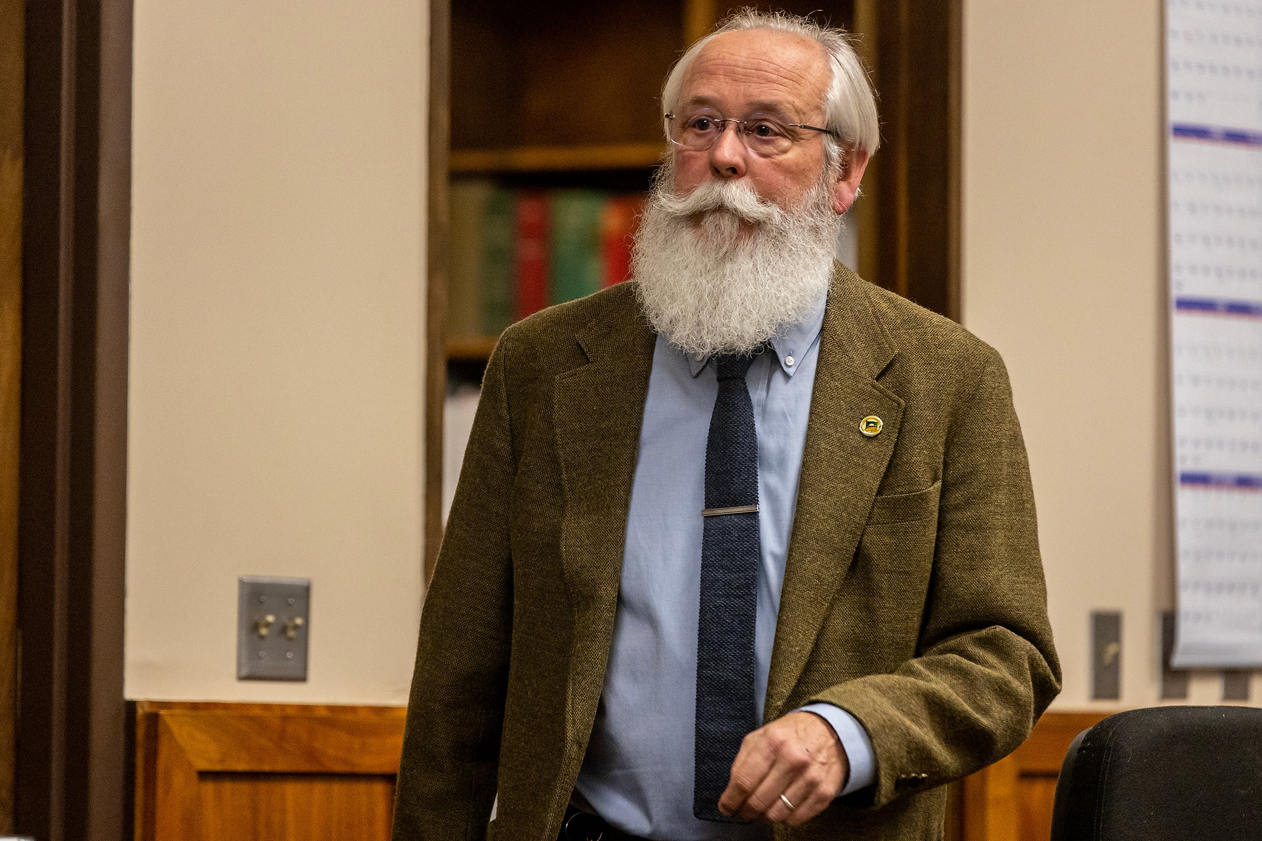 Latah County Prosecutor Bill Thompson walks through the courtroom