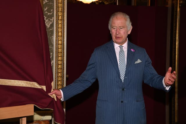 The King unveils the seal during the space sustainability event at Buckingham Palace (Eamonn McCormack/PA)