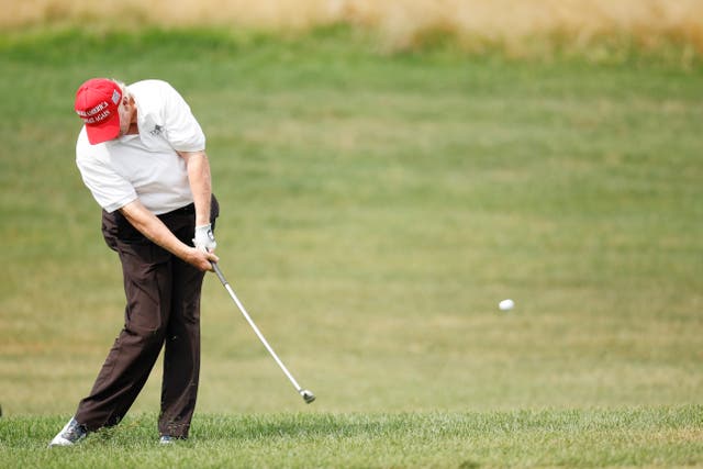 <p>Former U.S. President Donald Trump plays a shot on the first hole during the pro-am prior to the LIV Golf Invitational - Bedminster at Trump National Golf Club Bedminster on July 28, 2022 in Bedminster, New Jersey. </p>