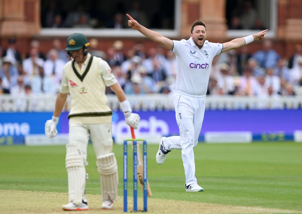 Ollie Robinson celebrates taking Marnus Labuschagne’s wicket