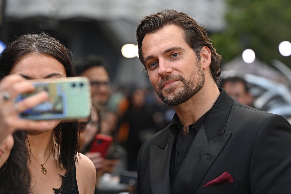 Henry Cavill attends premiere of The Witcher after announcing exit from show