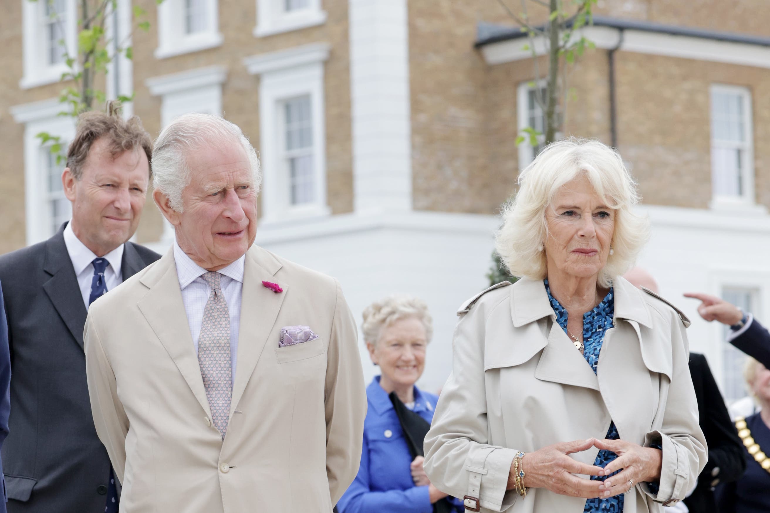 The King and Queen during a visit at Poundbury in Dorchester.