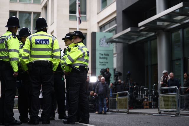 <p>Representative: Police officers stand guard in London</p>