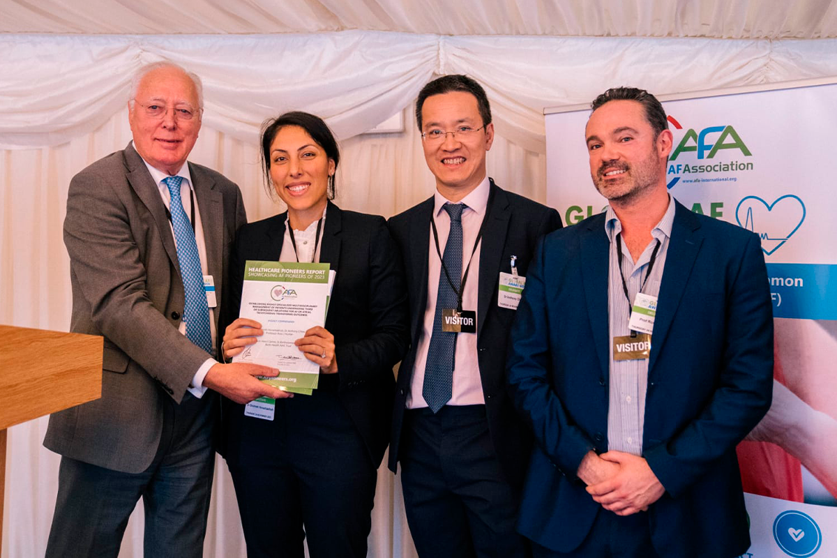Ross Hunter (right) and colleagues receiving an award at Westminster for innovations in Healthcare