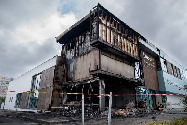 This photograph taken 29 June 2023 in Brest, western of France shows a Biocoop, an organic supermarket partly burnt, two days after a 17-year-old boy was shot in the chest by police at point-blank range in Nanterre, a western suburb of Paris